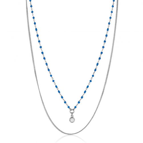 ZINZI zilveren multilook ketting met twee verschillende schakels: een subtiele gourmet schakel en een blauwe bolletjes schakel. De diverse kettingen geven de ketting een '2 in 1' uitstraling. Een mooie ronde zetting (5,5 mm) met witte zirconia hangt sierlijk aan de ketting. De lengte van deze ketting is te variëren tussen 42 en 45 cm. Met herkenbaar Zinzi hartje bij de sluiting. De ketting is vervaardigd van eerste gehalte zilver (925) en met extra rodiumlaag voor een langdurige glans.